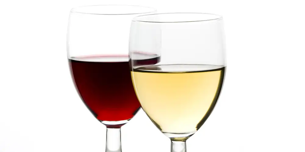 wine-glasses-with-red-and-white-wine two glasses of red and white wine that are and are not better the next day